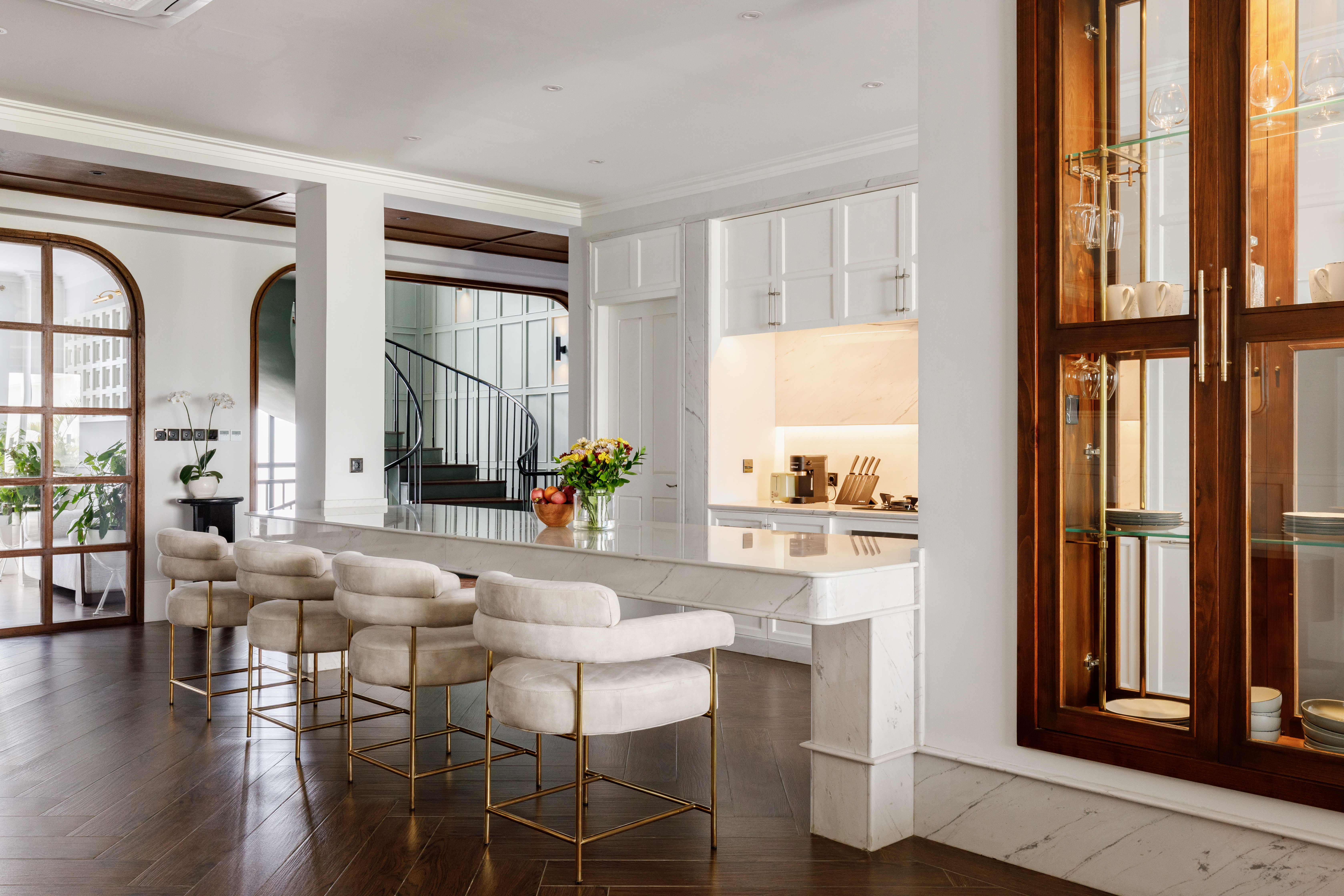 Kitchen with marble island at Mayfair Place